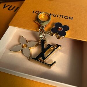 Louis Vuitton Gold Keychain with Flower Charms
Like new!